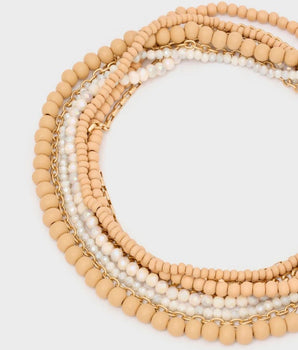 Nalì collana multifilo in legno e pietre oro